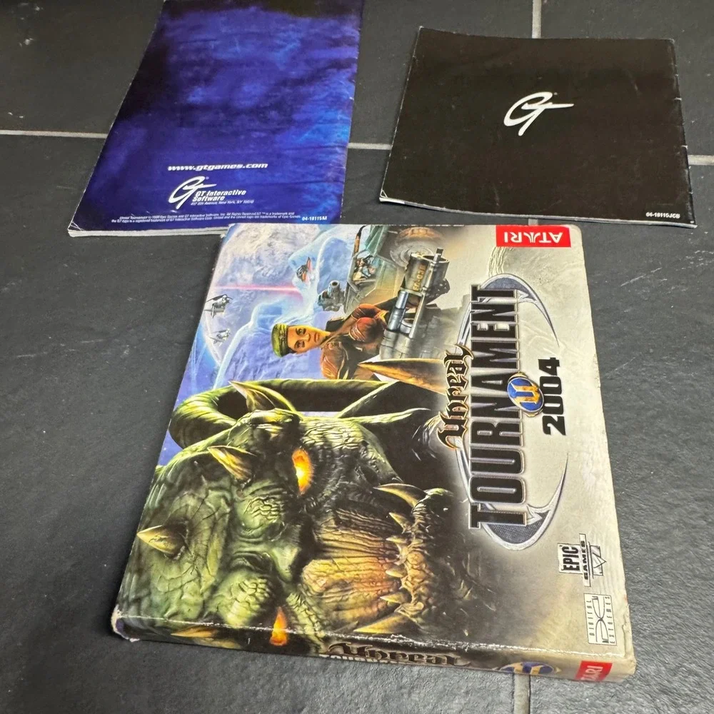 Unreal Tournament 2004 PC Game Atari Epic Games Play Disc and Manuals Set